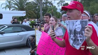 Protesters gather outside Laundrie home as police enter to speak with family