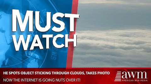 During Flight Man Spots Object Sticking Through Clouds, Takes Photo. Now It’s Going Viral