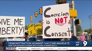 More than 200 people attend rally against vaccine mandate