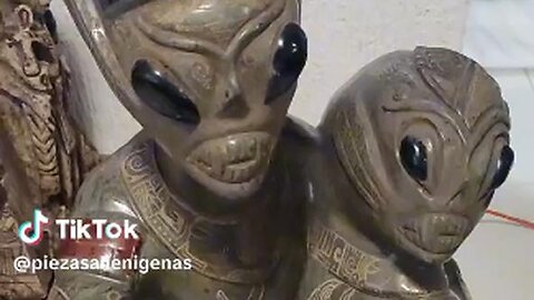 Is this evidence of ancient vampire aliens - or straight-up demons? Check out the fangs on these two