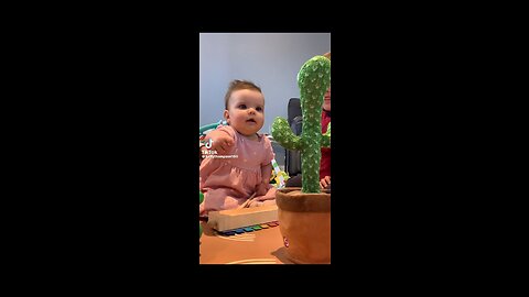 Baby has in depth conversation with taking cactus 🌵 toy viral hog