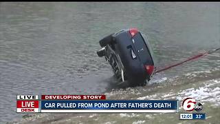 Father dies after rescuing child from vehicle after it plunges into pond on Indy's north side