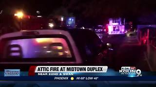 Three people safe after attic fire at midtown home