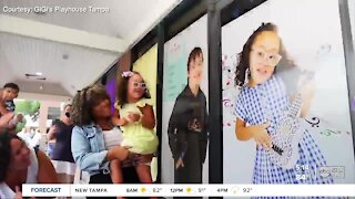 Kids with Down syndrome show off smiles in storefront 'welcome windows' at GiGi's Playhouse in Tampa