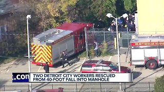 Two workers rescued after falling down manhole in Detroit