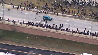 Organizers of Saturday's Elijah McClain protest demand answers after Jeep drove into the crowd while protesters blocked I-225