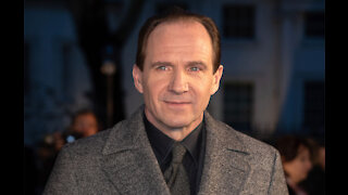 Ralph Fiennes has defended JK Rowling