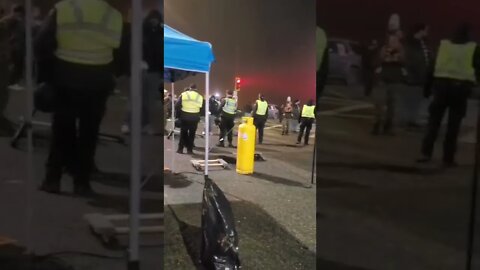 Canadian Police Troopers Making Arrests At Surrey, Canada At The Pacific Border