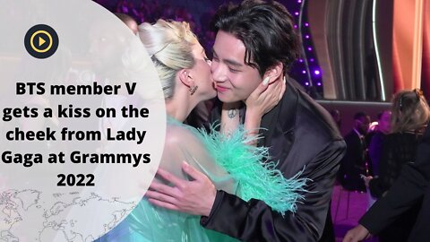BTS member V gets a kiss on the cheek from Lady Gaga at Grammys 2022.
