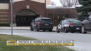 Outraged parents protest firing of football coach at Warren De La Salle