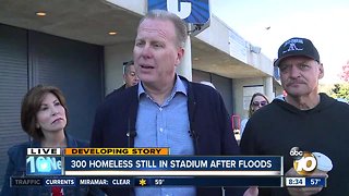 San Diego Mayor visits with homeless evacuated by flooding