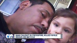 Man caught in crossfire, killed on bicycle