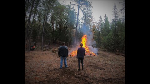 Fire season is over and husband & wife do the 1st burn on their property