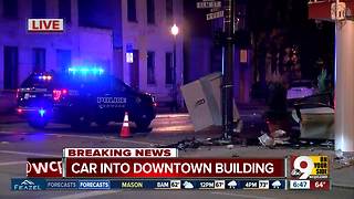 Car hits downtown Cincinnati building, catches fire after two-state police chase