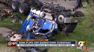 Semi falls 30 feet from downtown overpass