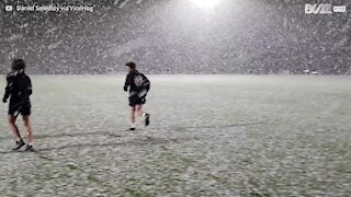 Rare snowfall not seen for half a century surprises Australian football team training session