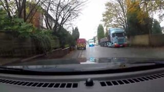 Mail truck goes on sidewalk to avoid ambulance