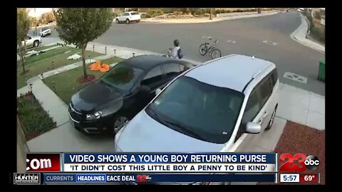 Caught on Camera: Video shows young boy returning purse