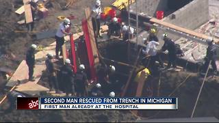 2 men trapped in collapsed trench rescued