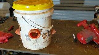 a useful mistake when making a bucket chicken feeder