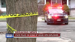 Police investigate home with explosives