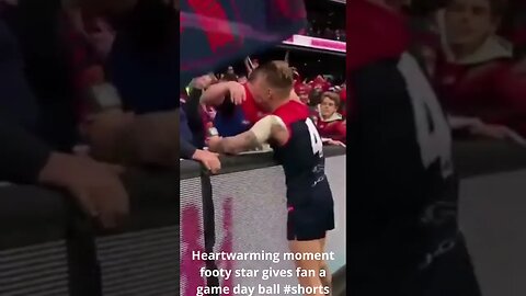 Heartwarming moment footy star gives fan a game day ball #shorts