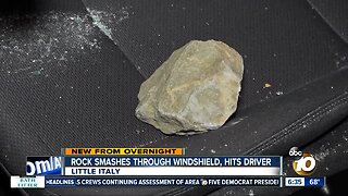 Rock smashes through car's windshield on I-5, hits driver in head