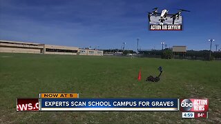 Technicians scanning a Tampa school campus for possible graves