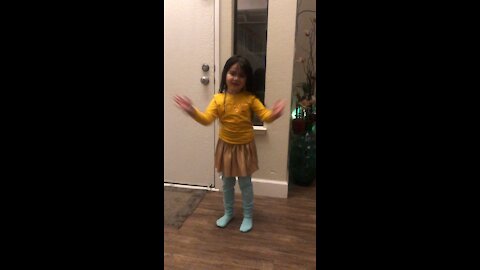 Doing her dance moves