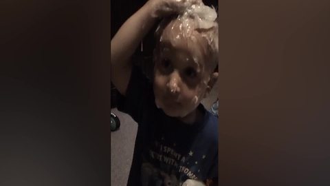 Tot Kid Gets Himself Covered With Vaseline
