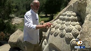 Massive Buddha statue carved into granite in East County