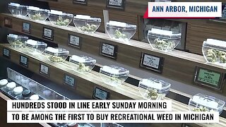 Crowds of people line up for first day of legal marijuana sales in Michigan