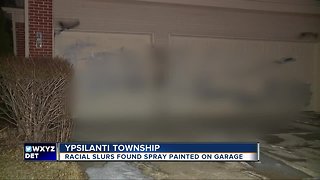 Ypsilanti Township family wakes up to racial slurs, derogatory language spray painted on garage