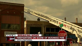 Firefighters on scene of business fire in Milwaukee