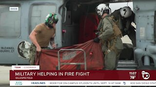 Military helping in fire fight