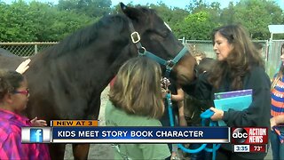 Horsing around: Seminole kids get to meet story book character
