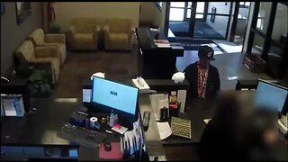Woman attempts to rob Premiere Bank on Dodge St