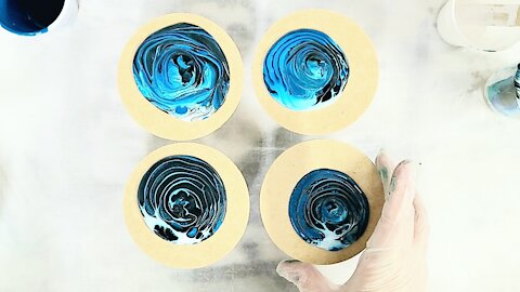 Acrylic pour tree ring coasters
