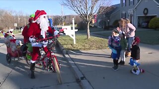 Local couple spreading Christmas cheer on two wheels