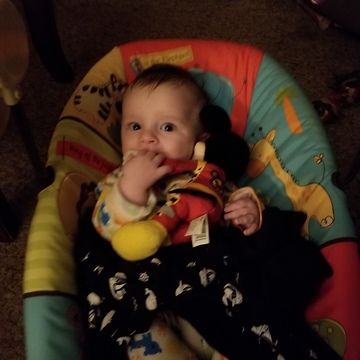 Baby talking to Mickey mouse