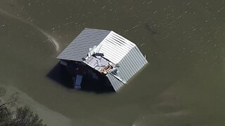 Chopper footage of home in Lee County completely under water.