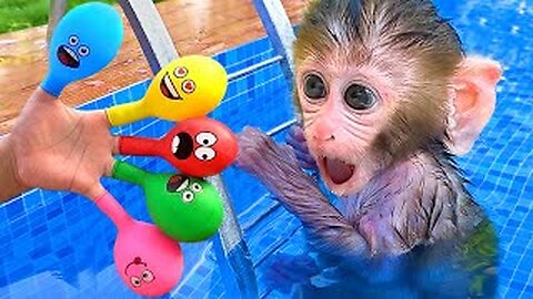 Monkey Baby Bon Bon outdoor fun with Flower Balloons