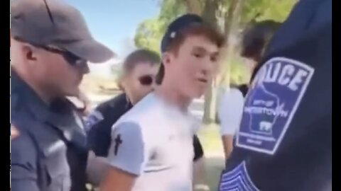 Young man arrested for sharing the Bible on a public sidewalk