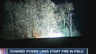 Arching power lines cause field fire