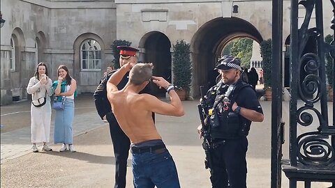 HE TAKES OFF HIS SHIRT AND WANTS TO SPAR THE CORPORAL AND ARMED POLICE #horseguardsparade