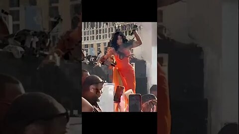 Cardi B tosses microphone after concertgoer throws drink at her on stage