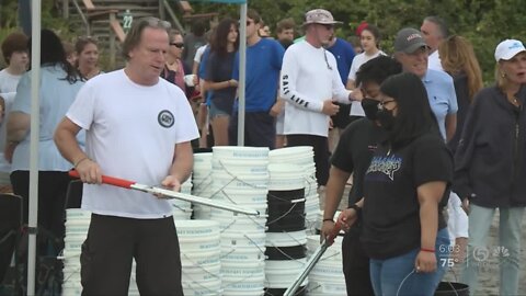 Community gathers to celebrate Perry Cohen's birthday with beach cleanup
