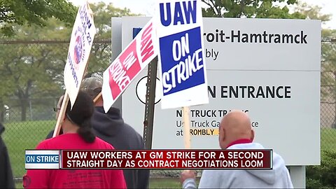 UAW workers at GM strike for second straight day as contract negotiations loom