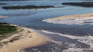 Bastion Point Mallacoota 11 March 2022 Lake in flood heading out to sea