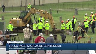 Search resumes for possible mass graves
